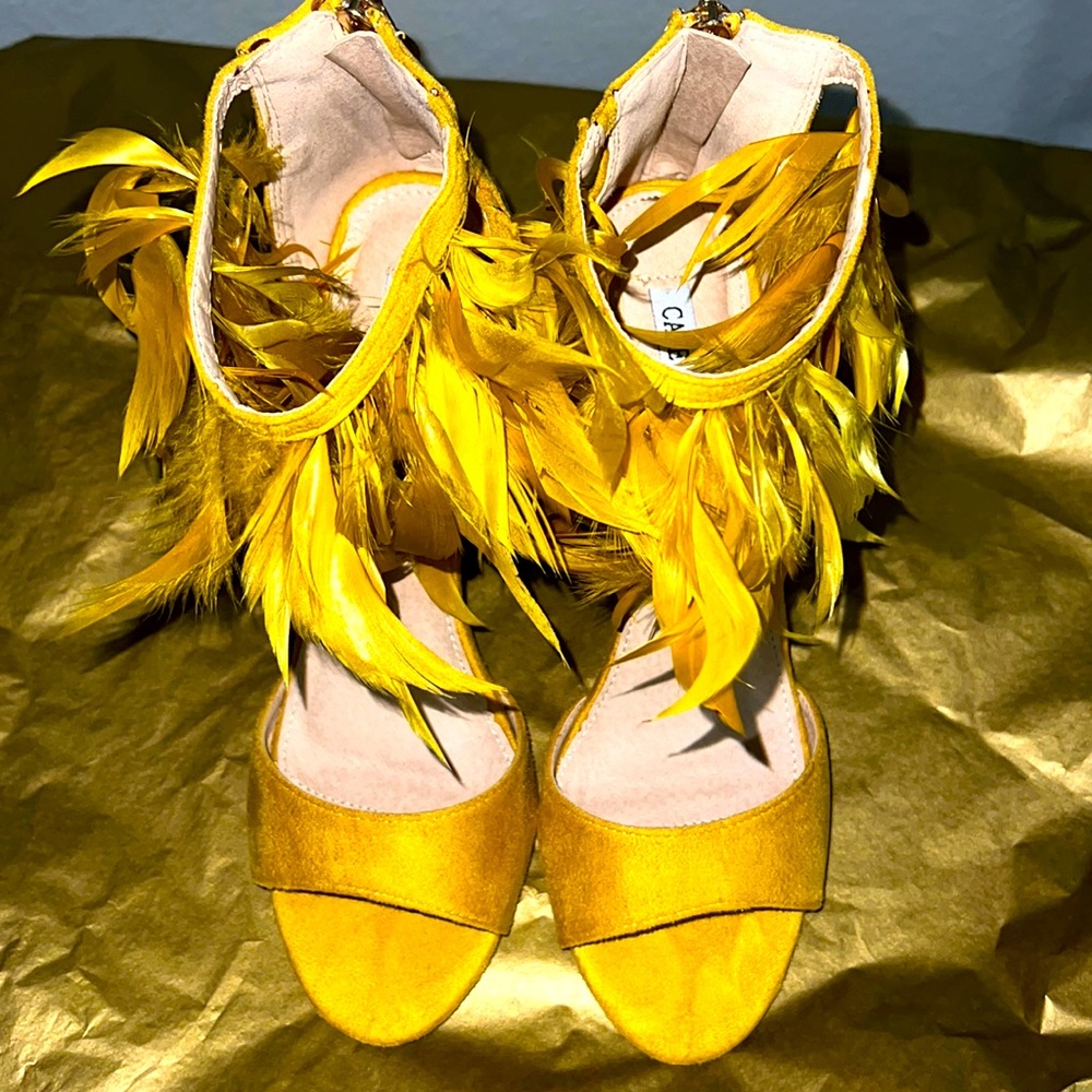 Bold, fun, feather trim heels